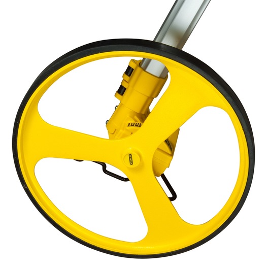 STANLEY 1-77-174 measuring wheel, yellow three-spoke design, side angle, white background.