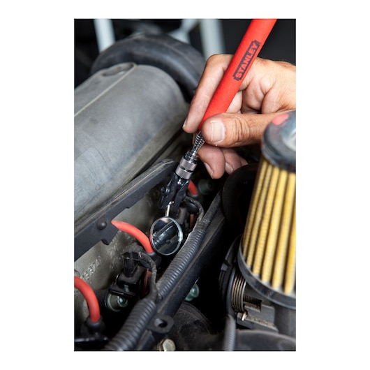Stanley 78-241 inspection mirror tool used to check engine parts, close-up photography.