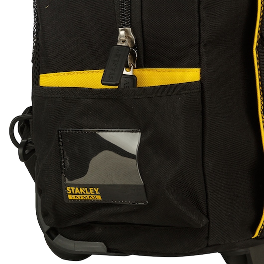 Stanley FMST514196 tool bag close-up, black fabric with yellow accents, front pocket and zipper detail.