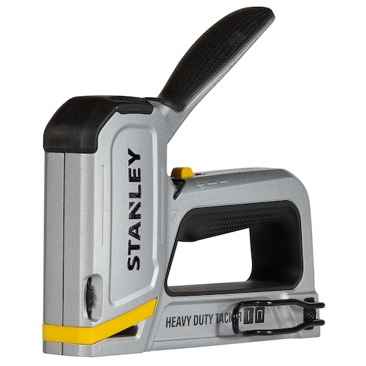 STANLEY STHT70250 heavy duty tacker, side angle, silver and black with yellow accents, visible handle grip.