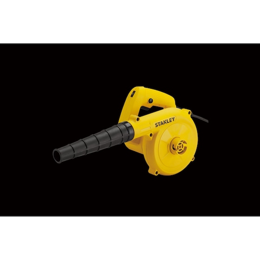 Photo of STANLEY STPT600-KR yellow electric blower with black nozzle, side angle, on black background.