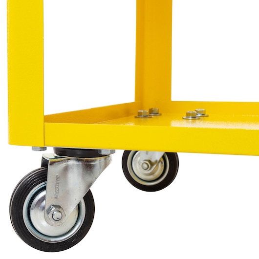 STANLEY STST98520LA yellow cart base with metal casters, close-up angle on white background.