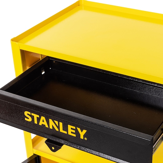 STANLEY STST98521LA yellow and black tool cart with open drawer, angled top view on white background.