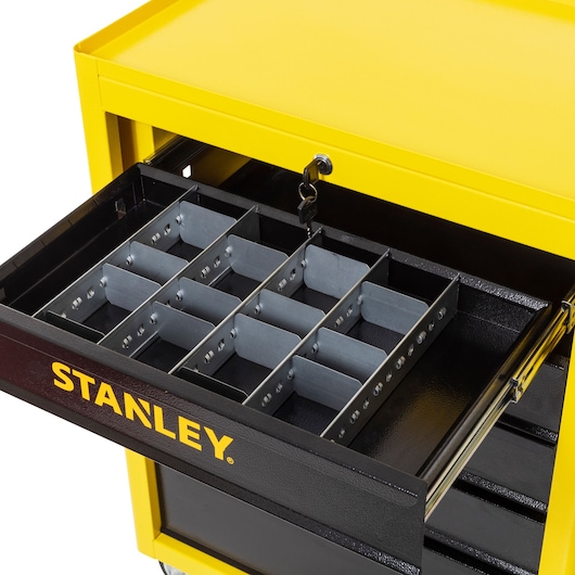 STANLEY STST98623LA tool cart top drawer with removable metal dividers, yellow and black, angled view.