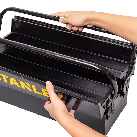 STANLEY STST98725LA black metal toolbox with handles, close-up, photography product category.
